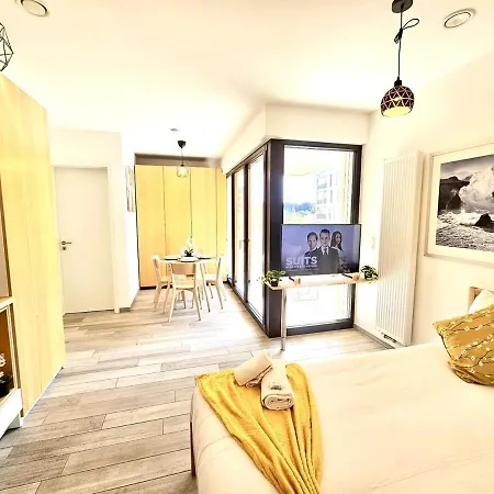 Urban Light Opening Onto A Terrace Apartment Luxembourg